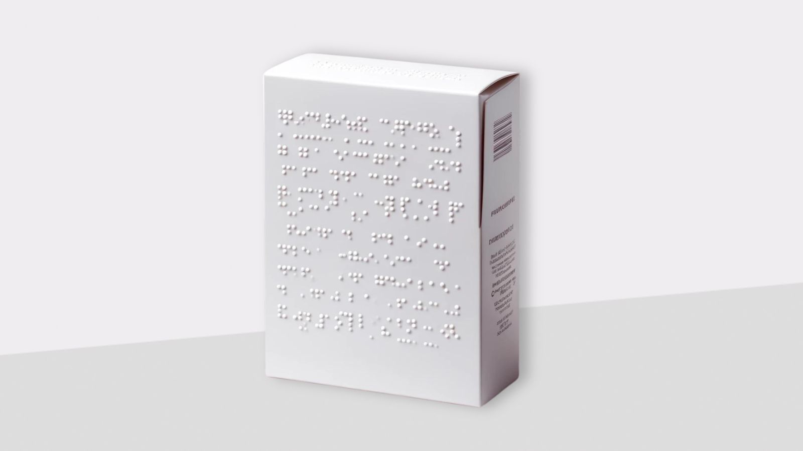 Nahaufnahme einer Braille-Prägung – taktile Präzision für barrierefreie und hochwertige Verpackungen.