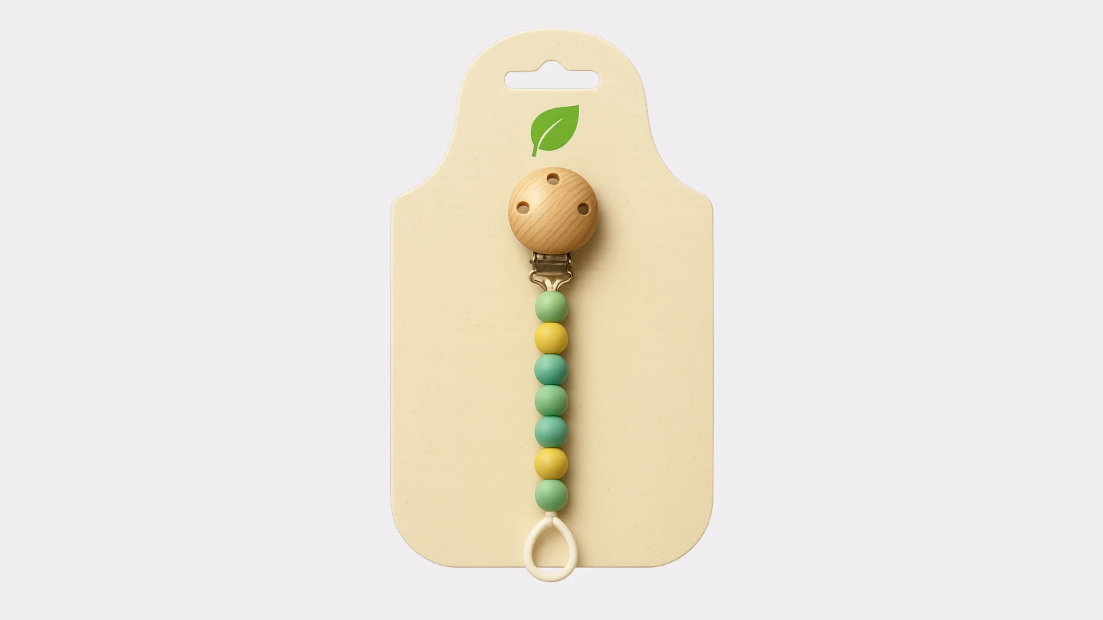 Packaging card made of solid cardboard with a pacifier chain made of wood and silicone beads
