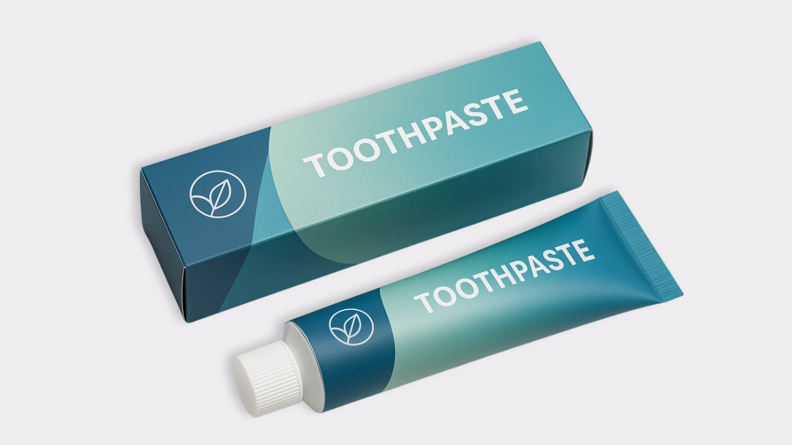 Emballage de dentifrice blanc avec motif ondulé turquoise et tube simple