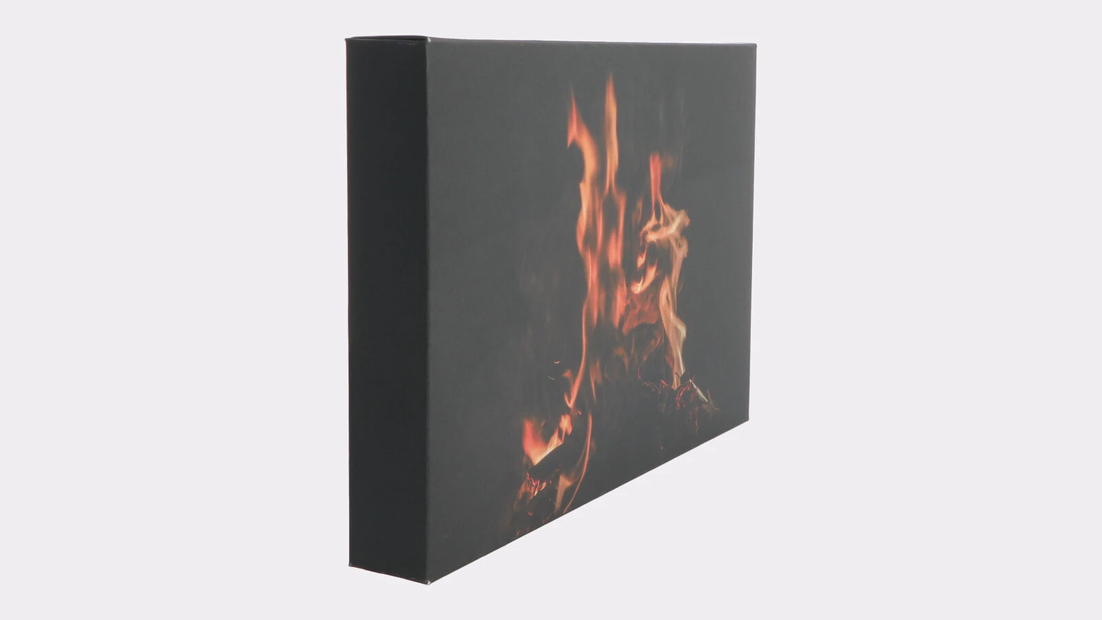 Side view emphasizes the depth and contrast of the dark photo canvas